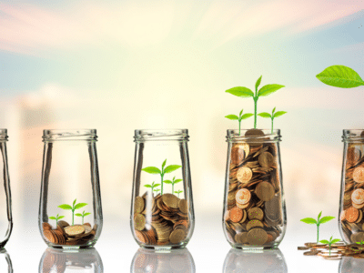 coins in jars, plants from coins, savings growth concept